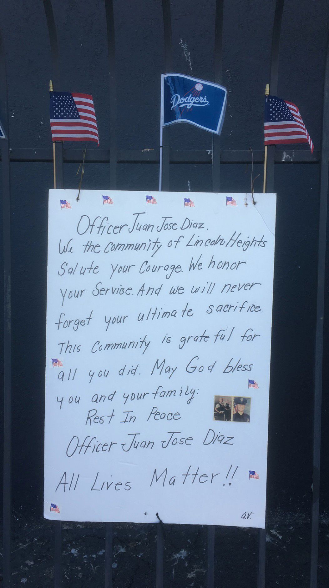Farewell message to Juan Diaz hanging from a fence in Lincoln Heights